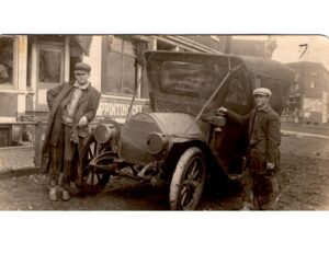 1912 Cadillac. Rudy Heintzman is standing on the right.