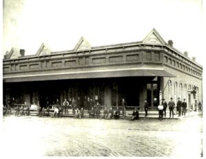 The old bank building (now the Post Office) at the intersection of Partridge and Davenport streets in Metamora, IL taken in the late 1800s or early 1900s.