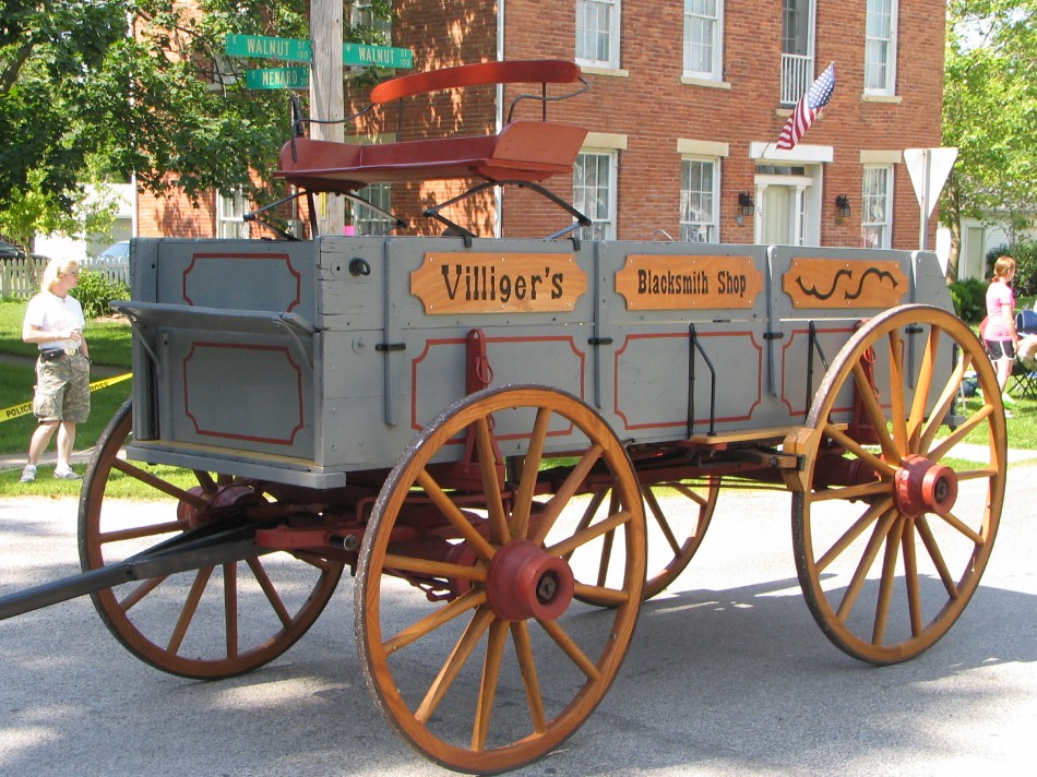 Wagon parades by the historic Stevenson home.