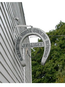 The original sign was returned to the front of the shop.