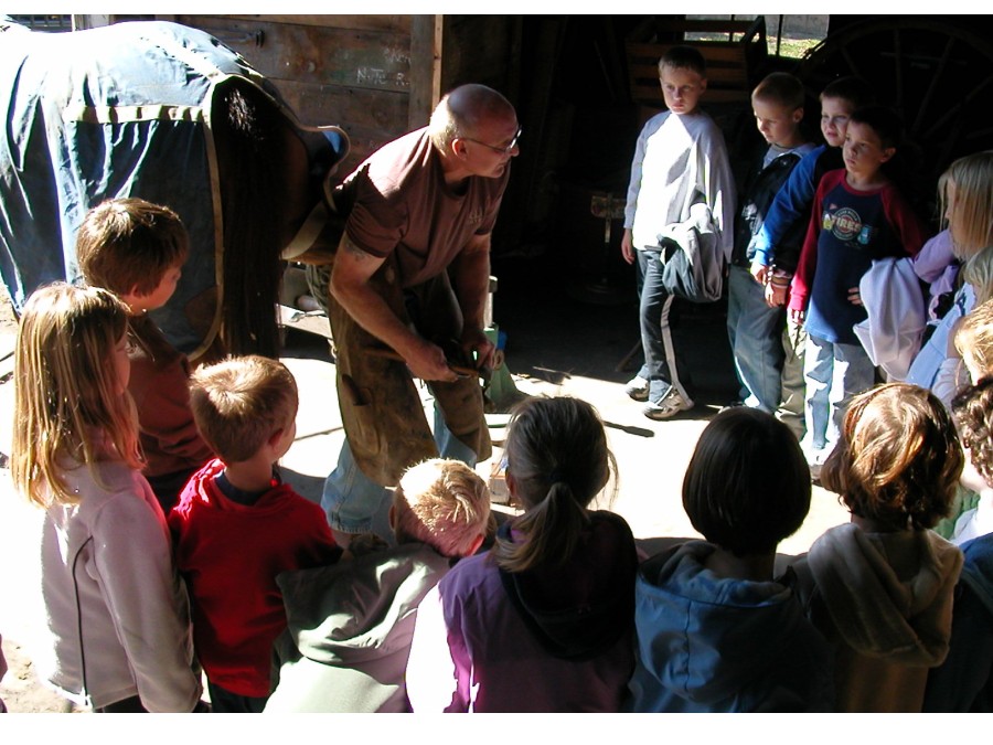 Local school children took a field trip to learn about horseshoeing.